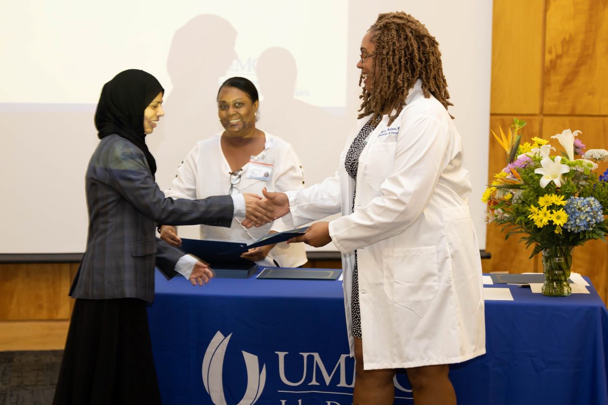 Student accepting an award at the 2023 Honors and Awards Ceremony